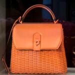 Handcrafted luxury leather handbag in rich tan vegetable-tanned leather