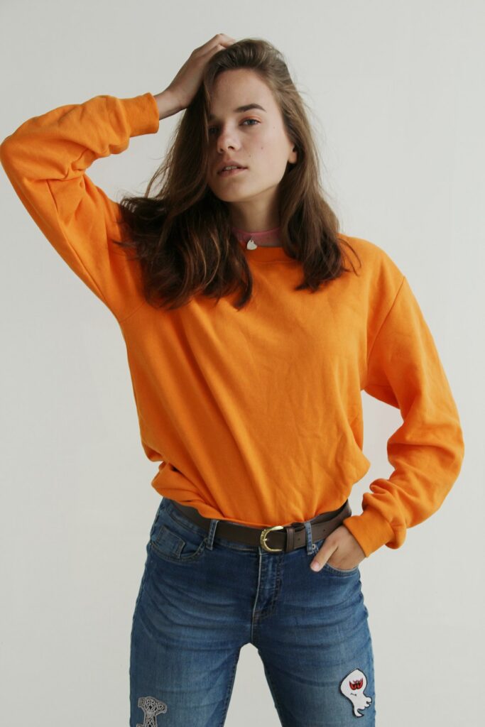 Relaxed model in soft cozy cream knitwear for a restful weekend