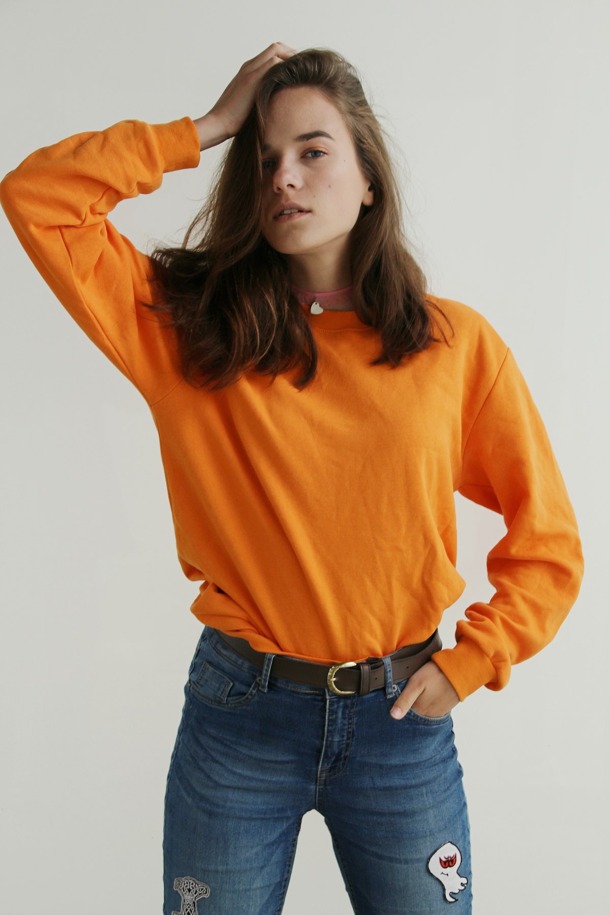 Relaxed model in soft cozy cream knitwear for a restful weekend