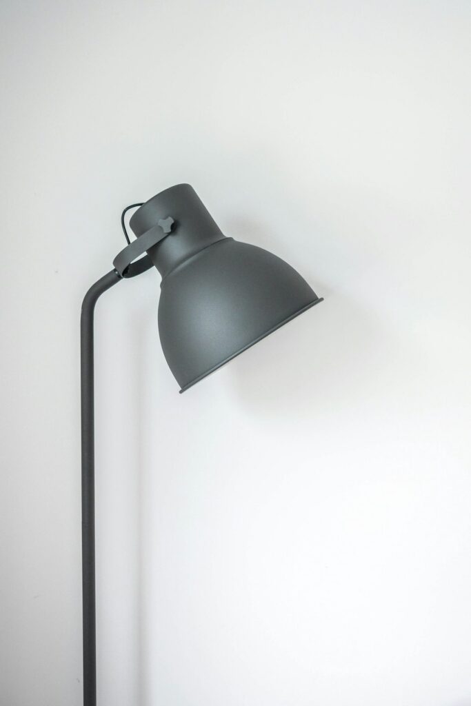Warm ambient pendant lamp casting soft golden light in calm room