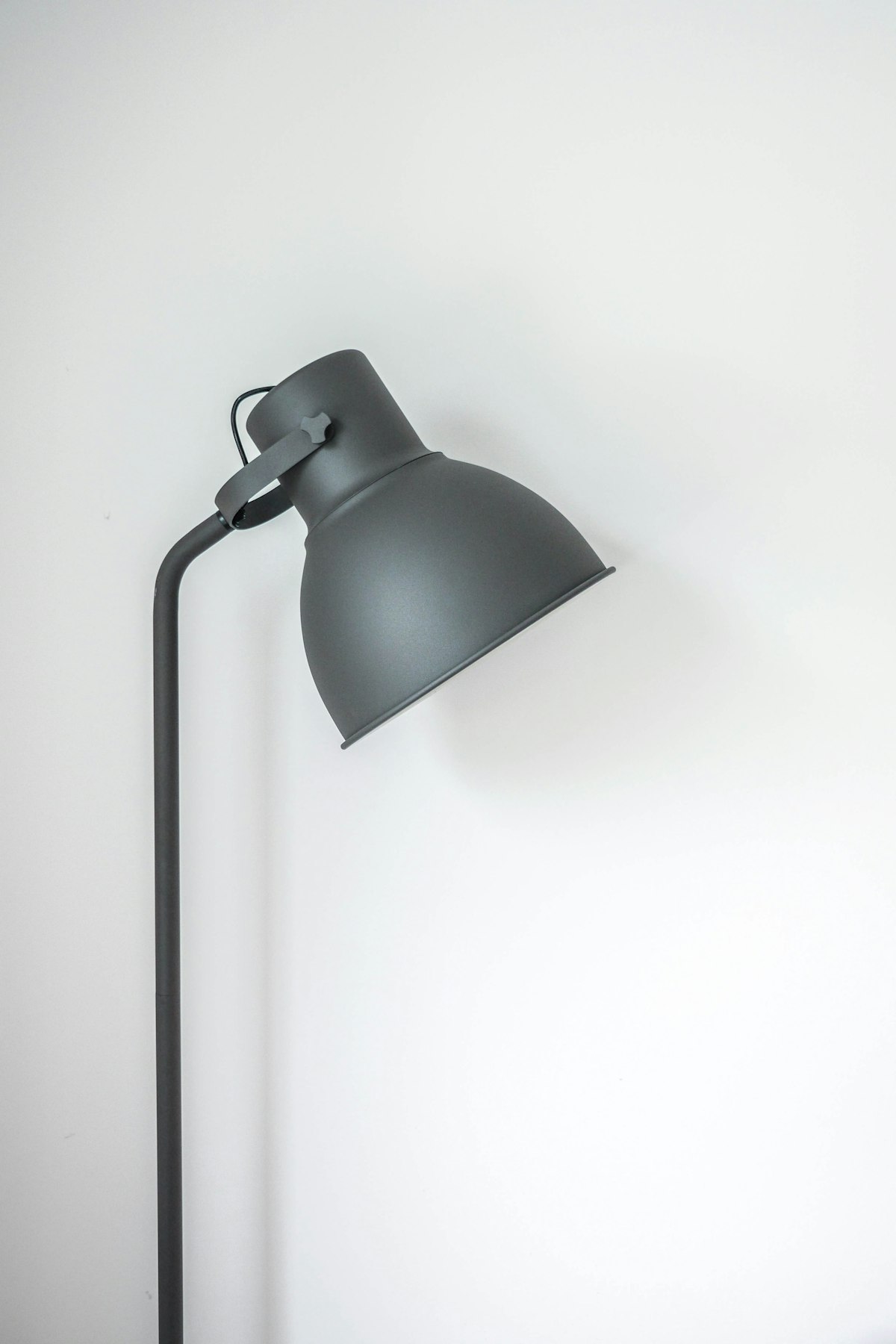 Warm ambient pendant lamp casting soft golden light in calm room