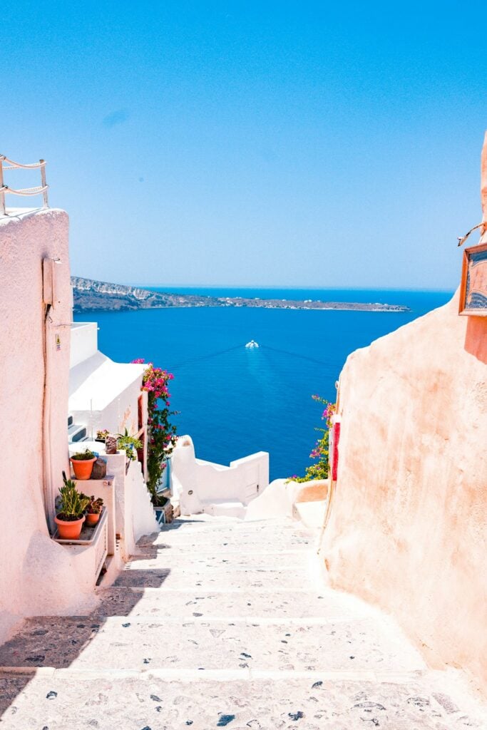 Panoramic view of colorful cliffside houses and turquoise water on Amalfi Coast