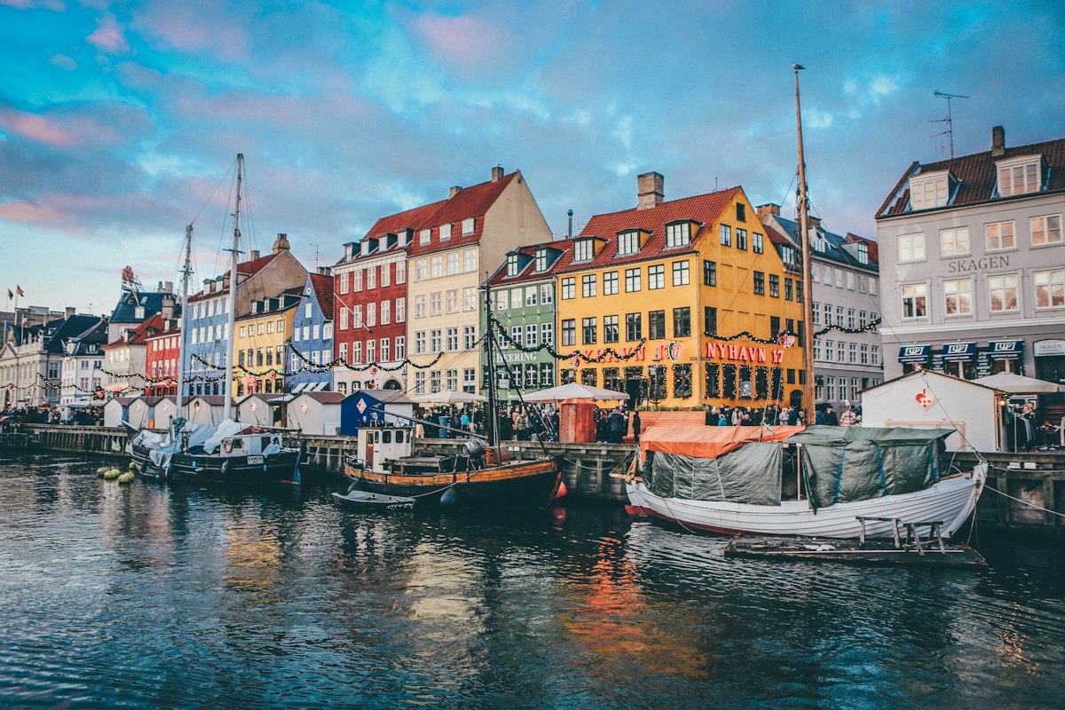 Copenhagen waterfront with clean modern architecture and cyclists
